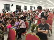 河西岸举办文化走亲志愿者维持现场秩序