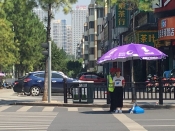 发改局志愿者积极参加“创文明交通、治秩序乱象”活动