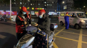 兴越社区守小门志愿者