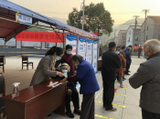 兰亭司法所工作人员参与新陈村核算检测志愿活动